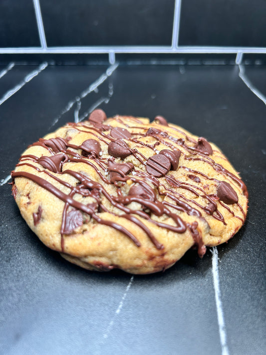 Chocolate chip cookie with chocolate drizzle 