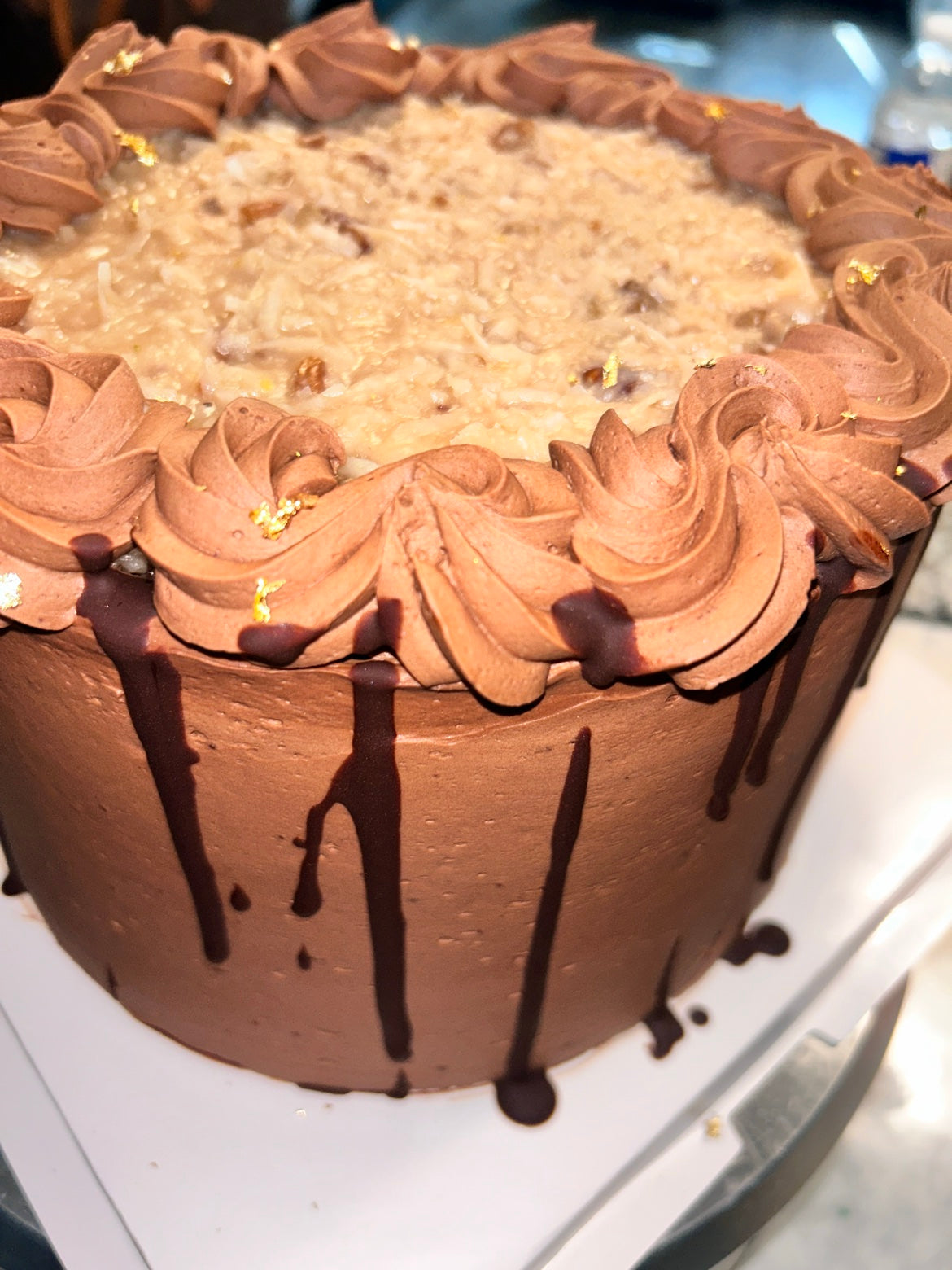 German chocolate layered cake close-up - Yummm A Cupcakery Thanksgiving